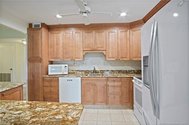 This light and bright second floor condo is in an elevator