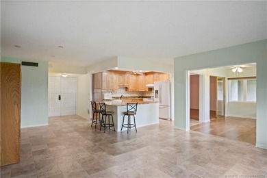 This light and bright second floor condo is in an elevator