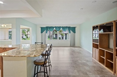 This light and bright second floor condo is in an elevator