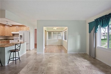 This light and bright second floor condo is in an elevator