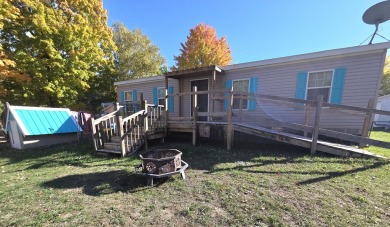 Discover your ideal lakeside getaway on beautiful Upper Evans