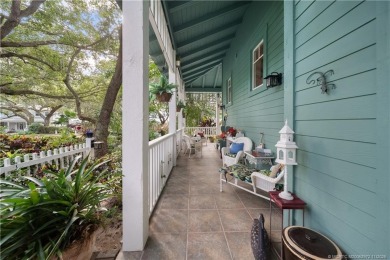 Attention car collectors!!! This unique lushly landscaped 3