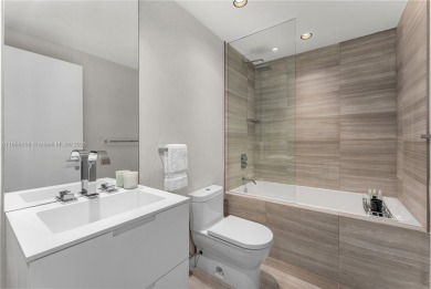 Discover refined waterfront living at The Ritz Carlton