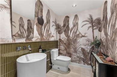 Discover refined waterfront living at The Ritz Carlton