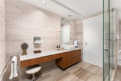 Discover refined waterfront living at The Ritz Carlton