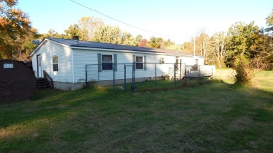 Escape to the country with this spacious 3-bedroom, 2-bath