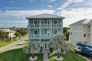 Enjoy paradise on South Hutchison Island from this beautiful