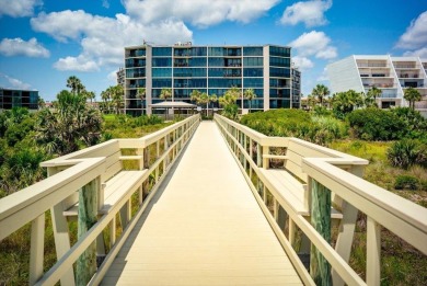Easy beach access from this updated ground floor condominium at