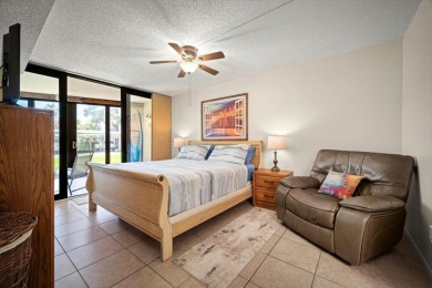 Easy beach access from this updated ground floor condominium at