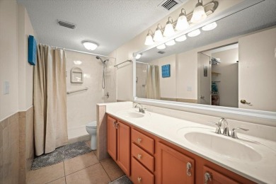 Easy beach access from this updated ground floor condominium at