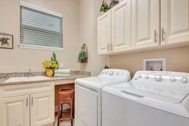 Welcome to a rare opportunity to live in Palma Sola Bay Club, a