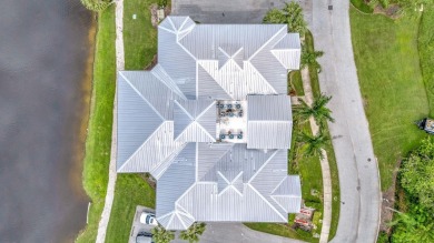 Welcome to a rare opportunity to live in Palma Sola Bay Club, a