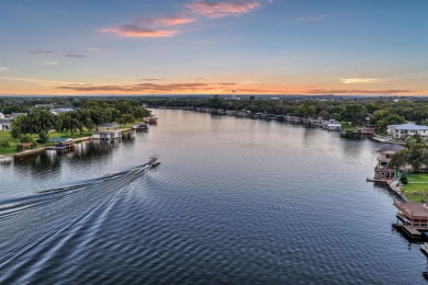 Experience lake living at its best in this exceptional