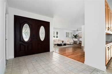 Welcome to this inviting two-story home, peacefully tucked at