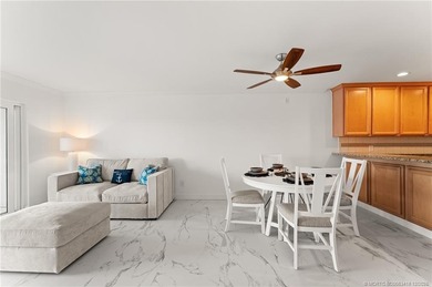 This is coastal living at it's best! This beautifully updated 1