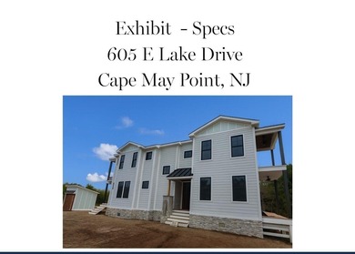 This lake-view corner, new-construction home is situated on a