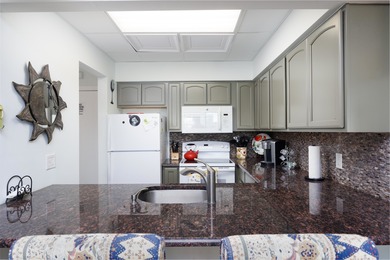 Experience true beachfront luxury in this stunning top-floor