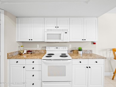 Move right in! Partially furnished 2 bedroom 2 bath beautifully