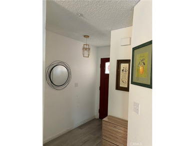 This house is situated in a quiet, well-maintained community