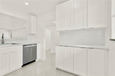 Discover this beautifully updated first-floor condo in the