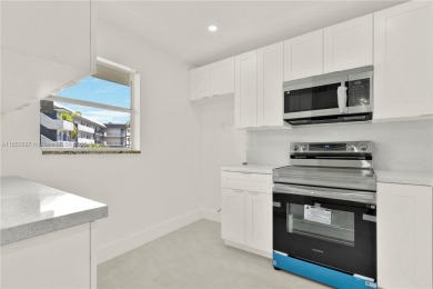 Discover this beautifully updated first-floor condo in the