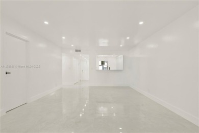 Discover this beautifully updated first-floor condo in the