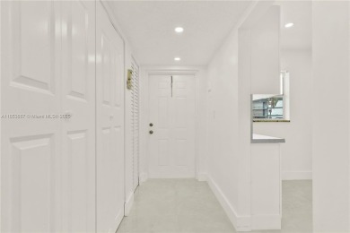 Discover this beautifully updated first-floor condo in the