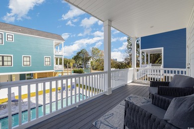Just a quarter mile from the beach, this stunning 5-bedroom, 5