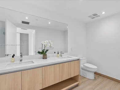 Experience elevated island living in this stunning brand-new, 2