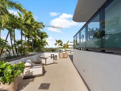 Experience elevated island living in this stunning brand-new, 2