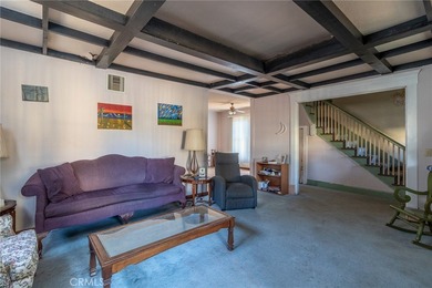 Discover the potential in this 4-bedroom, 2-bath home offering 1