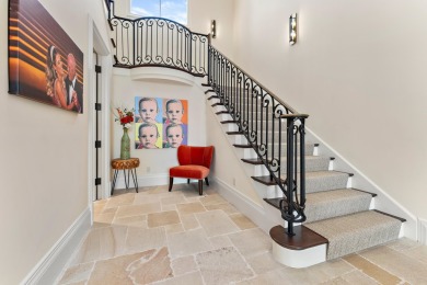 Enjoy the elegance of this custom, over 9,000 square ft estate