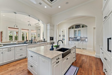 Enjoy the elegance of this custom, over 9,000 square ft estate