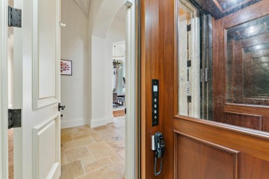 Enjoy the elegance of this custom, over 9,000 square ft estate