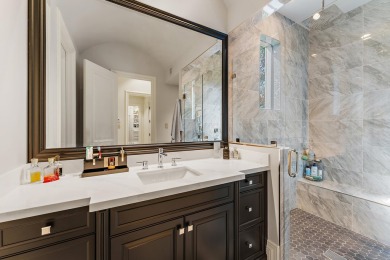 Enjoy the elegance of this custom, over 9,000 square ft estate