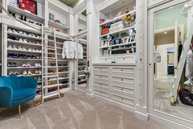 Enjoy the elegance of this custom, over 9,000 square ft estate