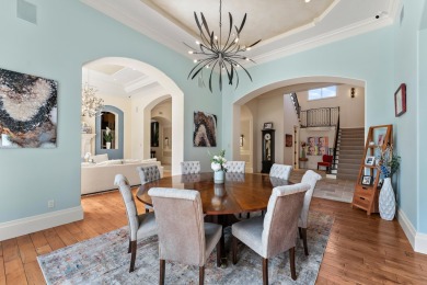 Enjoy the elegance of this custom, over 9,000 square ft estate