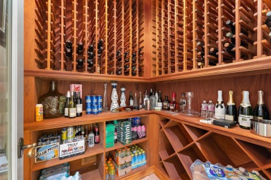 Enjoy the elegance of this custom, over 9,000 square ft estate