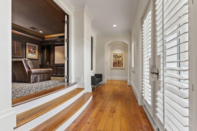 Enjoy the elegance of this custom, over 9,000 square ft estate