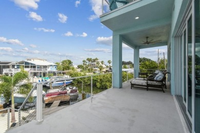 Stunning custom waterfront home. 3-bedroom, 3-bath, this