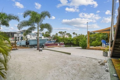 Stunning custom waterfront home. 3-bedroom, 3-bath, this