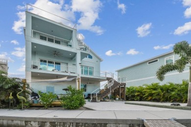 Stunning custom waterfront home. 3-bedroom, 3-bath, this