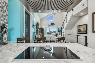 Stunning custom waterfront home. 3-bedroom, 3-bath, this