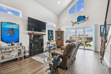 Stunning custom waterfront home. 3-bedroom, 3-bath, this