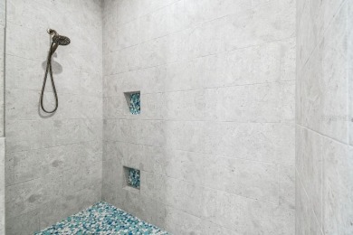 Stunning custom waterfront home. 3-bedroom, 3-bath, this