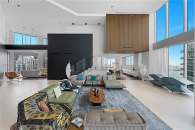 EXQUISITELY REDESIGNED TWO-STORY PENTHOUSE BY TOGU DESIGN &