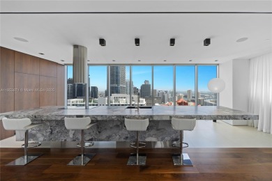 EXQUISITELY REDESIGNED TWO-STORY PENTHOUSE BY TOGU DESIGN &