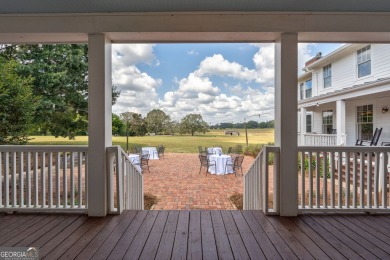 Nestled along the shores of Lake Oconee, this extraordinary