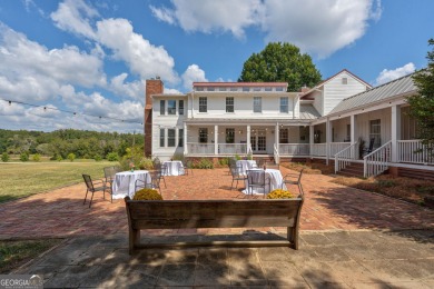 Nestled along the shores of Lake Oconee, this extraordinary