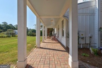 Nestled along the shores of Lake Oconee, this extraordinary